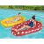 Kids relaxing on pineapple and strawberry inflatable pool floats