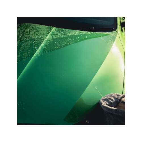 Meguiar's Microfiber Duo Twist Drying Towel used to dry a green car