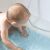 Baby using BabyOno anti-slip bath mat in bathtub