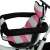 Pepita Little One trike with pink canopy, parent handle, basket and bell, close-up detail of the seat