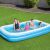 Happy family enjoying Bestway 305x183x46cm Inflatable Pool