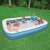 Family enjoying Bestway inflatable pool in backyard