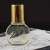 Gloria Vanderbilt Jardin a New York 100 ml Eau de Parfum Spray üveg asztalon