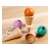Wooden ice cream cone catch game, with a ball on a string, in pastel colors