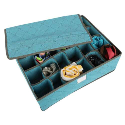 Blue fabric underwear storage box with 24 compartments, open, showing underwear inside