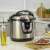 Timeless Tools 6L multifunction electric pressure cooker in use, cooking a meal