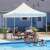 Family enjoying a sunny day under a Timeless Tools Pavilon garden gazebo