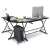 Timeless Tools L-shaped desk in black, showing setup with laptop, monitor, and accessories