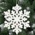 Springos White Glitter Snowflake Christmas Ornament hanging on Christmas tree