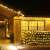 Springos 144 LED warm white net lights, decorating a house exterior