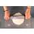 Woman using Springos silicone baking mat to roll out dough in a kitchen