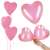Springos pink heart balloons held in hand, party decoration