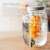 Navaris 4 liter glass beverage dispenser with fruit infuser