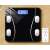 Intelligens LCD bathroom scale, black, max 180 kg, with Bluetooth, measures 8 parameters, connects to smartphone app, shown with a smartphone displaying the app