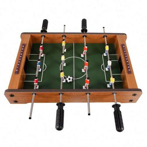 Tabletop foosball game with wooden frame, green playing field, and 12 players