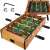 Tabletop foosball game with wooden frame, green playing field, 12 players, and two balls