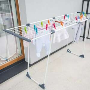 The York Family Star clothes dryer with clothes drying on it, showing its large capacity and versatility - YORK