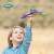 Child holding a paper airplane, Avenir origami