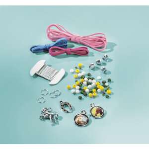 Contents of the Pretty Pony DIY bracelet making kit: cords, beads, charms, and other accessories - Totum