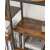 VASAGLE industrial style bookshelf with 5 shelves, rustic brown and black, close-up of shelf with books and a speaker
