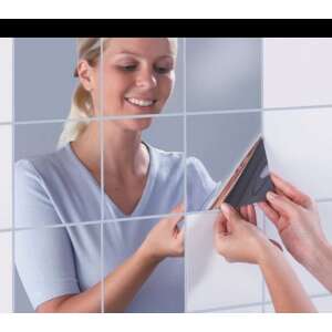 Woman applying self-adhesive mirror tiles to a wall - Living Room Furniture