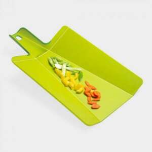 Green foldable cutting board with vegetables, angled view - Cutting board
