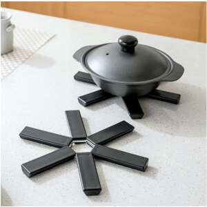 Foldable pot holder for hot pots and pans, black, heat-resistant, non-slip - Trivet