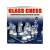 Glass chess set with frosted and clear glass pieces and board, 25 cm
