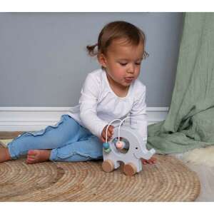 Child playing with Jabadabado pastel wooden rolling developmental toy elephant - Developmental Toy for Baby