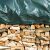 Close-up of firewood stack covered with Takaró fólia protective tarp