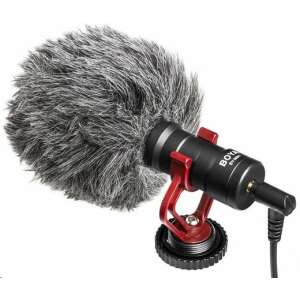 Boya BY-MM1 Mini Shotgun Microphone with furry wind shield, red mount, angled view - Microphone