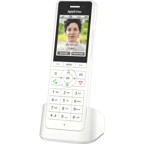 AVM FRITZ!Fon X6 DECT phone, white, with color display, showing a woman's face on the screen