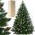 Springos 250 cm artificial Christmas tree with snow-frosted tips and pine cones, next to its packaging