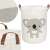 Springos koala laundry basket with brown handles, white canvas with grey koala design
