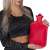 Woman using a Springos 2L red rubber hot water bottle