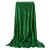 Draped Springos emerald green plush blanket with gold pattern