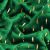 Close-up of Springos emerald green plush blanket texture with gold accents