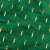 Springos green plush blanket with gold dots, close-up of fabric texture