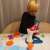 Child playing with Kruzzel Play Dough Mixer Set with Accessories