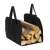 Black firewood carrier bag with velcro closure, carrying firewood