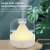 Dollcini mountain humidifier with warm light, essential oil diffuser, home, office, Christmas gift, white color, on wooden surface, with mist