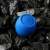 Boompods Zero portable Bluetooth speaker in blue, on rocks