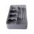 Gray plastic cutlery organizer with compartments for knives, forks, and spoons