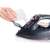 Close-up of filling the ETA Kiara cordless steam iron with water