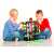 Children playing with Fischertechnik Profi Dynamic M building set, 557 pieces, 4 models