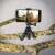 Hama Flex tripod for smartphone and action camera, black, mounted on a tree branch