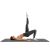 Woman exercising on Springos grey yoga mat