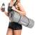 Woman carrying Springos exercise mat