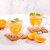 Quasar & Co. Double-walled tea cups with orange slices and ice