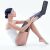 Woman Using Timeless Tools Air Compression Leg Massager